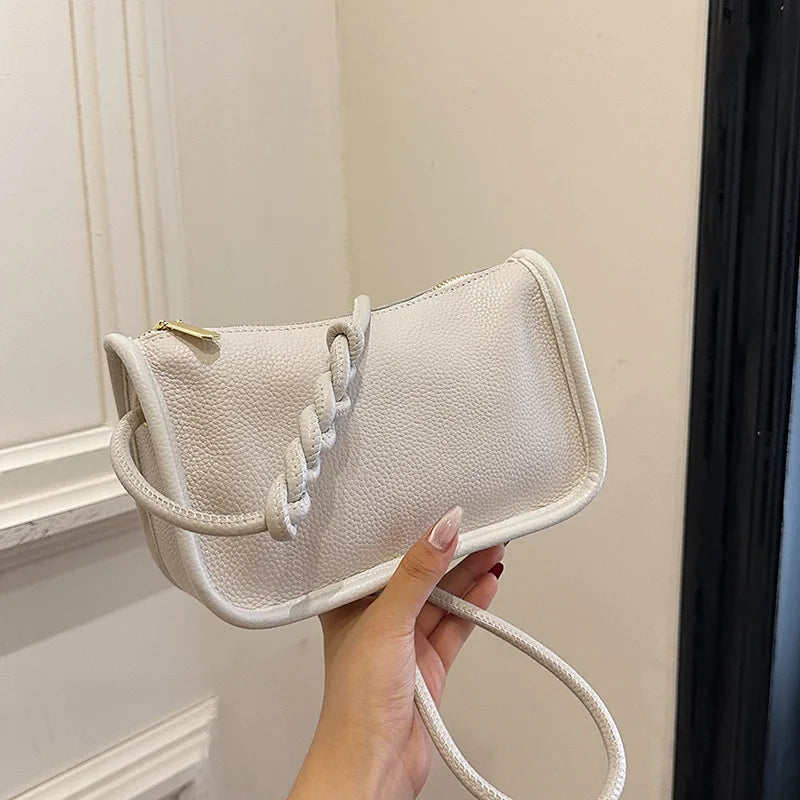 Eva – crossbody handtas van rundleer met verstelbare riem