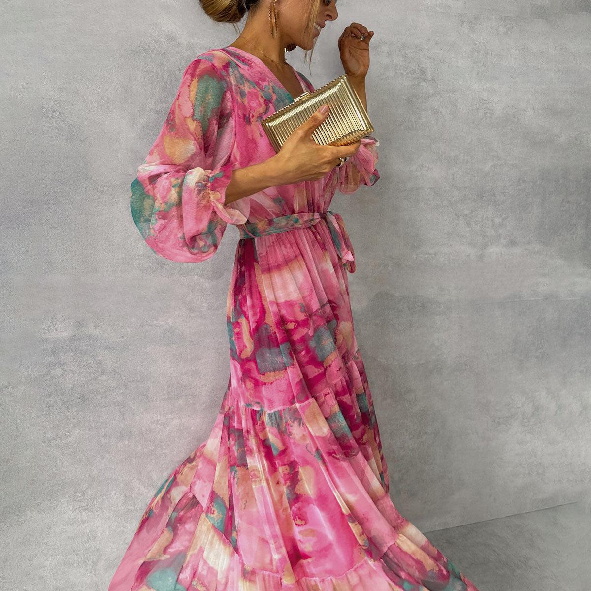 Mila – Roze bloemen maxi jurk met lange mouwen en wikkelmodel