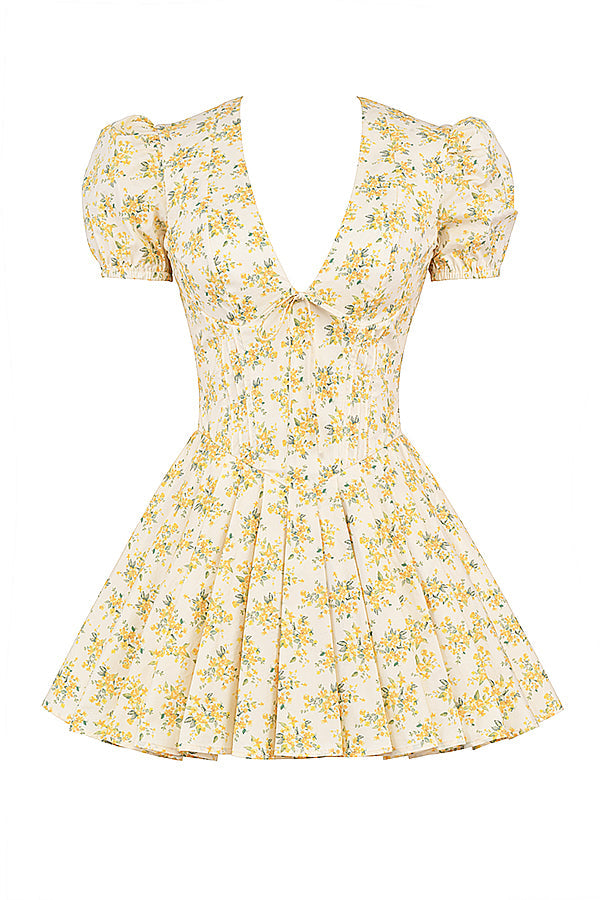 Eva – Flatterende bloemenprint zomer jurk met geplooide rok