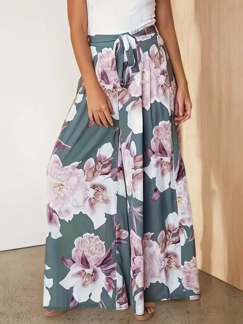Aisling – Bloemenprint, hoge taille, wijde palazzo-broek met strikceintuur