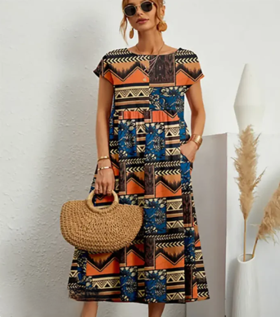 Virginia Bloom – Lichte midi-jurk met kleurrijke bloemenprint en A-lijn rok