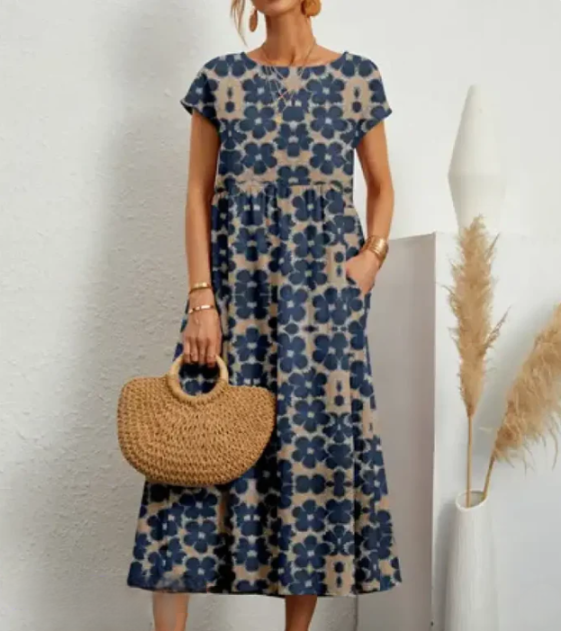 Virginia Bloom – Lichte midi-jurk met kleurrijke bloemenprint en A-lijn rok