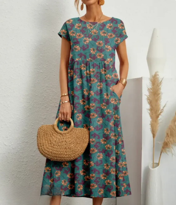 Virginia Bloom – Lichte midi-jurk met kleurrijke bloemenprint en A-lijn rok