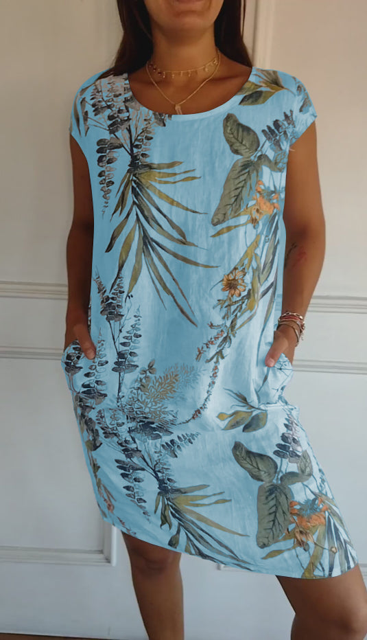 Joslyn – Luchtige Bloemenprint Midi Zomerjurk met Ronde Hals