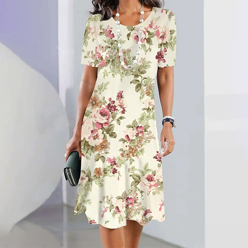 Elin – boho jurk met blauwe bloemen en V-hals