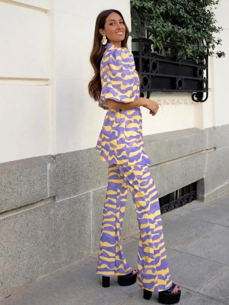 Nina – co-ord blazer set met pofmouwen in paars-gele zebra print