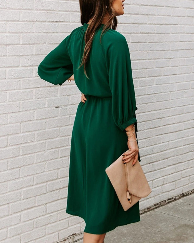 Elena – midi-jurk met ceintuur en ronde hals
