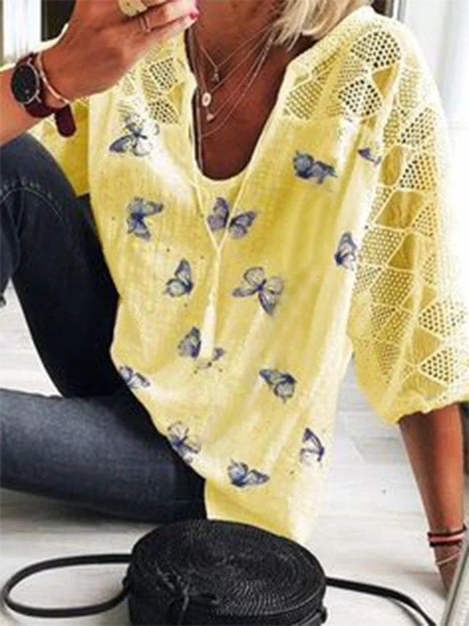 Angela – zomer blouse van viscose met knoopdetail aan de mouw