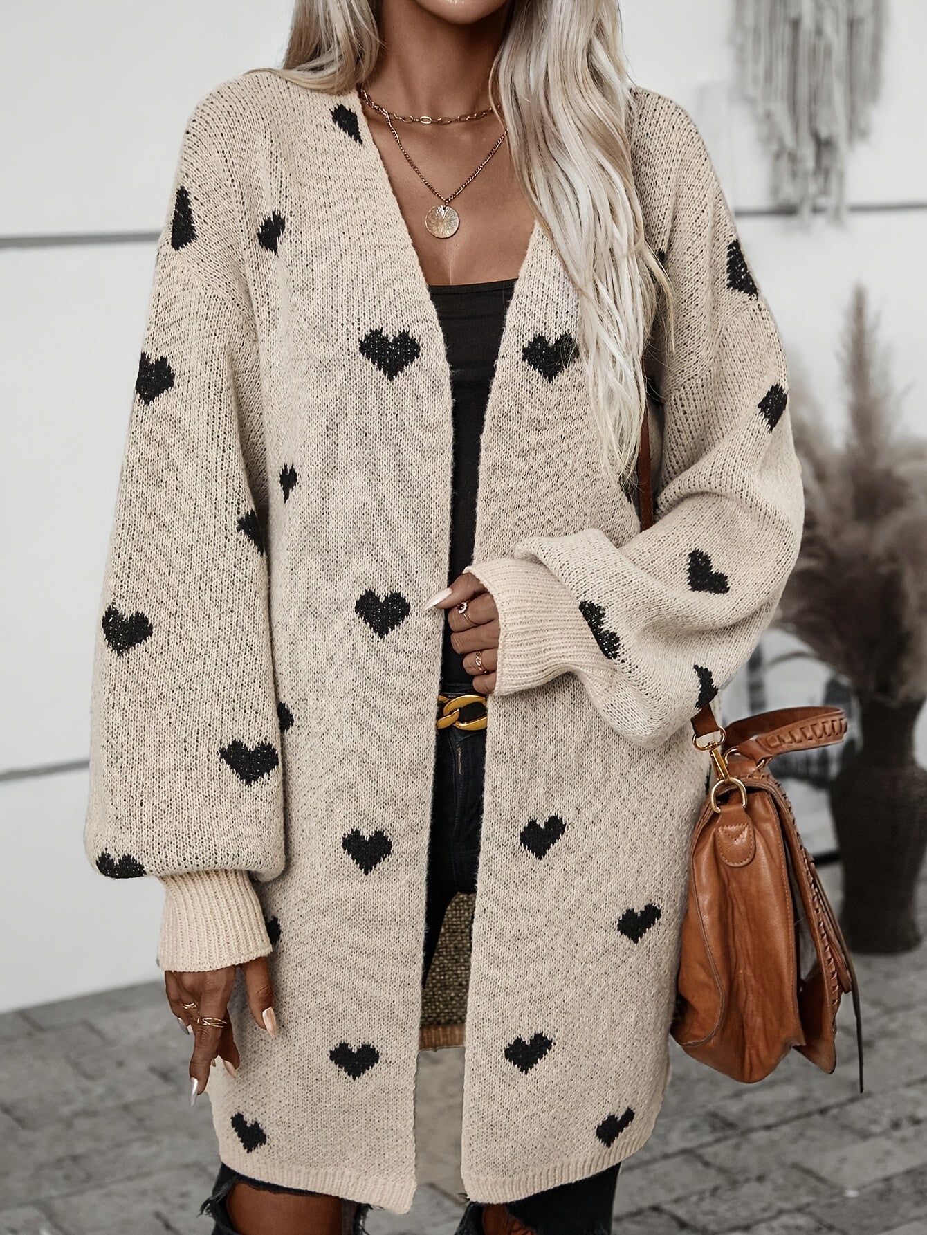 Lana – gebreide cardigan vest met hartjesmotief en knoopsluiting