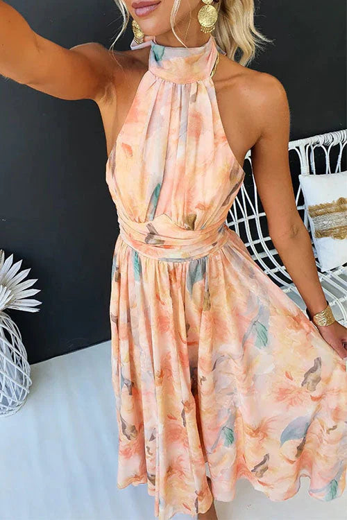 Sandra – Mouwloze Halternek Maxi jurk Met Bloemenprint En Open Rug