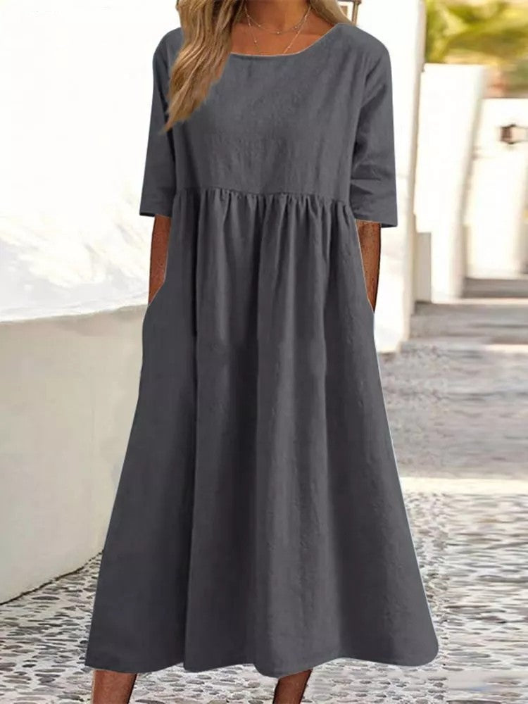 Urna – midi-jurk met halve mouwen en verfijnde taille