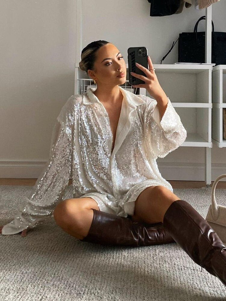 Sofie – Witte oversized blouse met zilveren glansdraad en ronde zoom