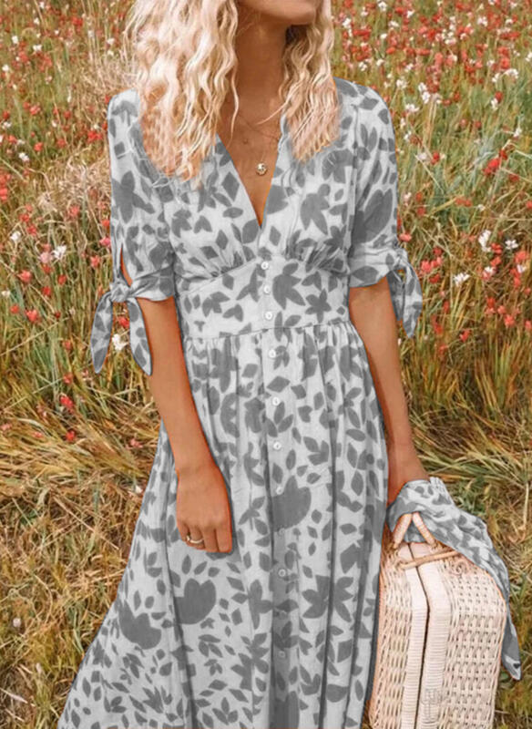 Lena – V-hals Zomerjurk met bloemenprint en strikmouwen