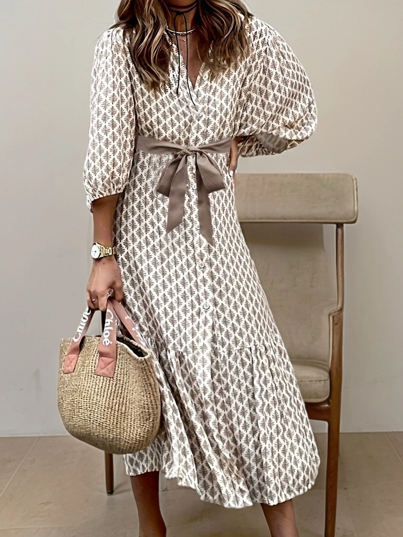 Elise – midi-jurk met pofmouwen en subtiel patroon