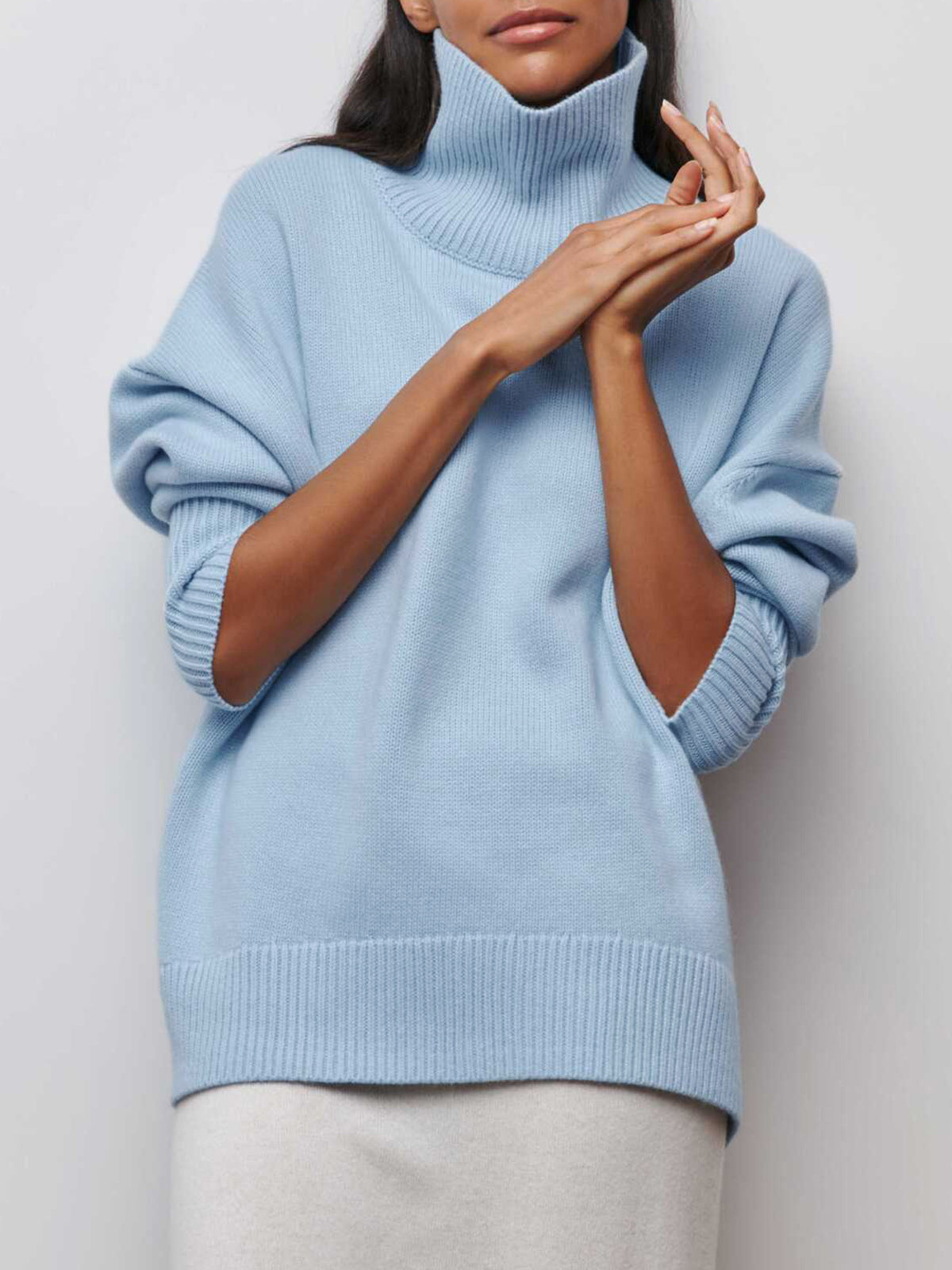 Livia – oversized ribgebreide coltrui met hoge hals en relaxte fit