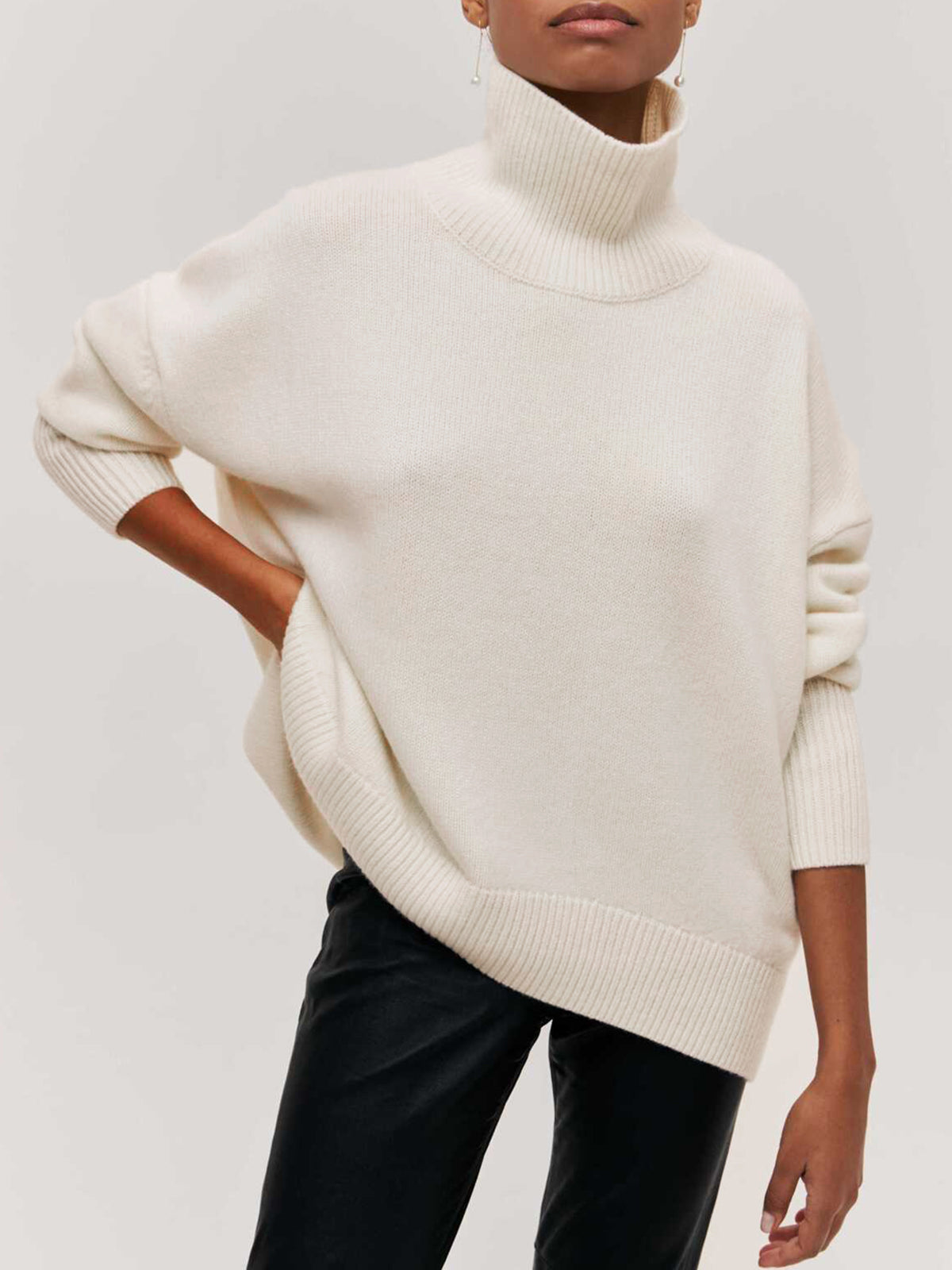 Livia – oversized ribgebreide coltrui met hoge hals en relaxte fit