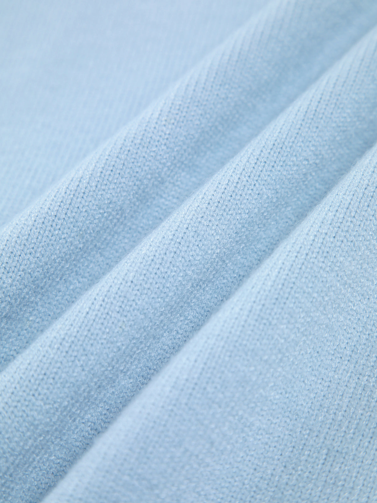 Livia – oversized ribgebreide coltrui met hoge hals en relaxte fit