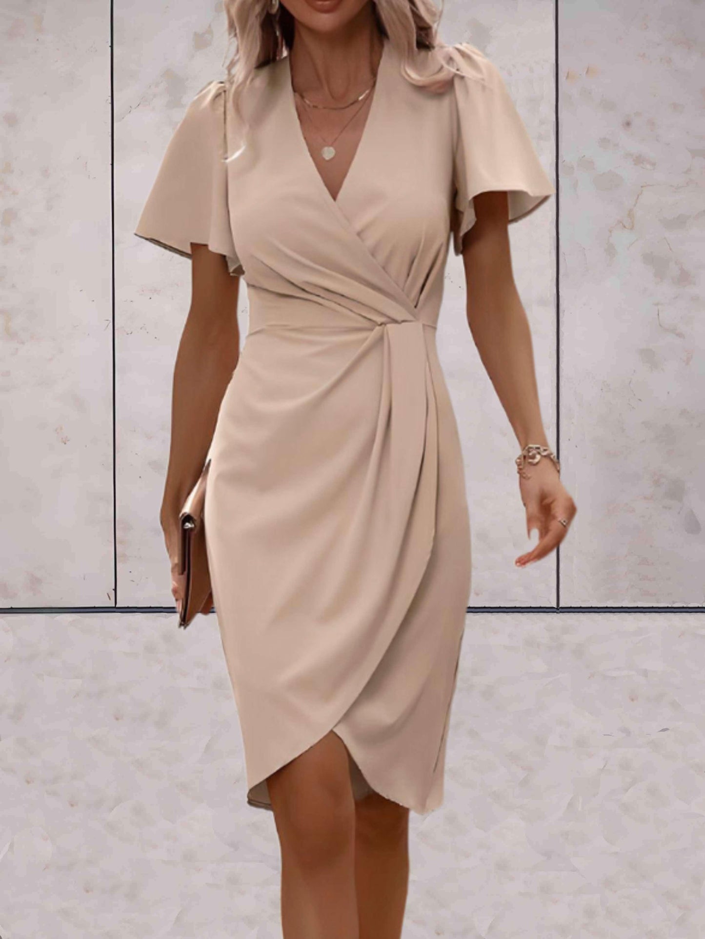 Sophia – Beige bloemenprint jurk met lange mouwen en ceintuur