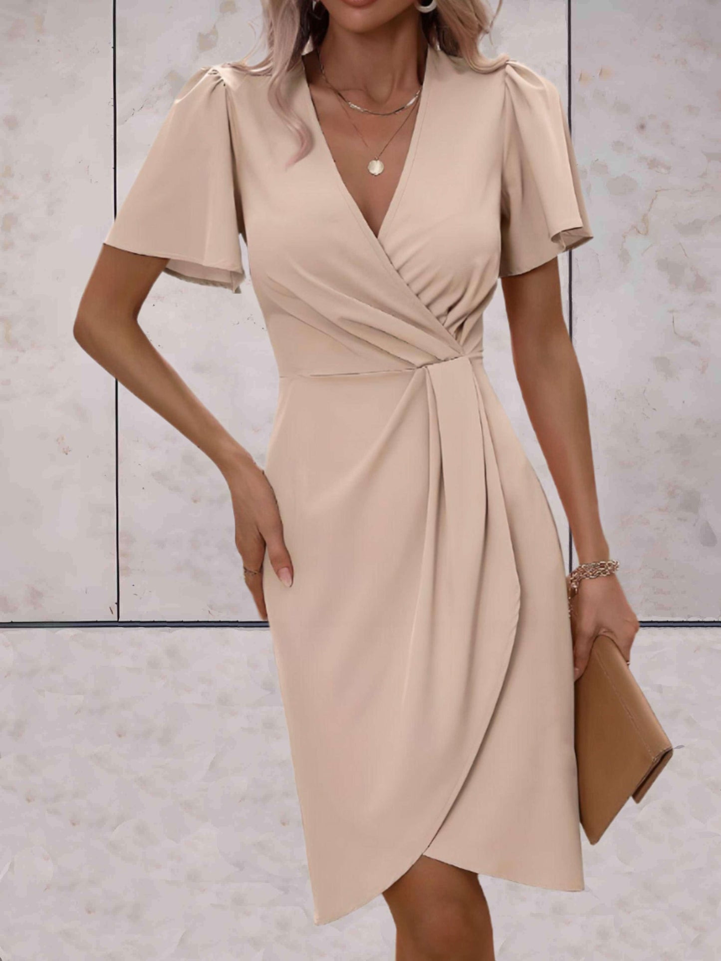 Sophia – Beige bloemenprint jurk met lange mouwen en ceintuur