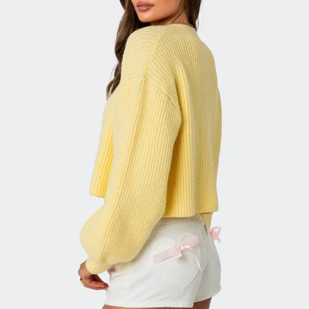 Lynn – gebreid cardigan vest met lanternmouwen en knoopsluiting