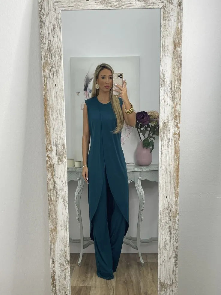 Mira – Zachtgrijze jersey set met asymmetrische top en hoge taille broek