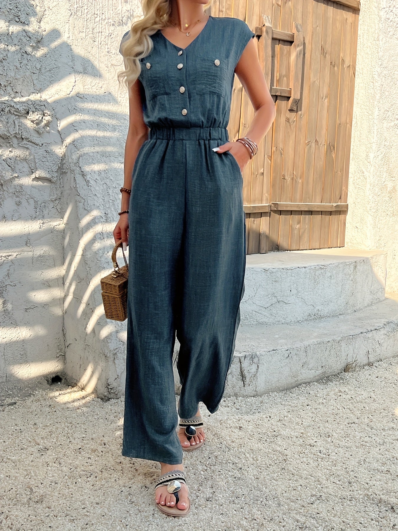 Marley – V-hals jumpsuit van viscose met gerimpelde taille