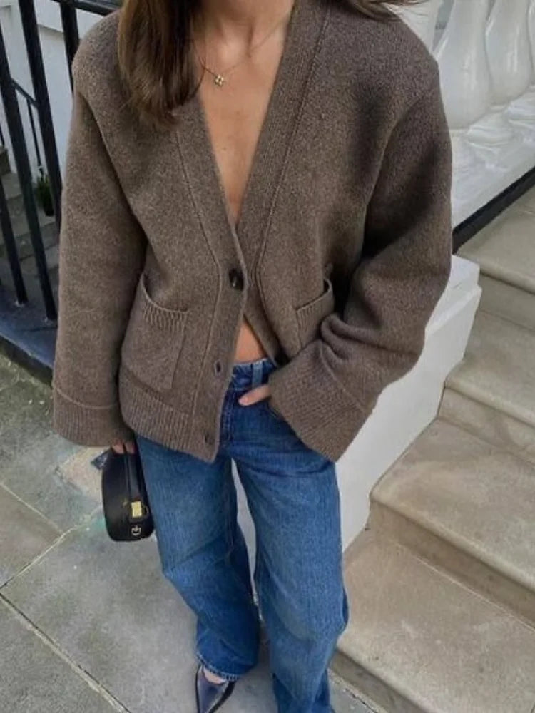 Romy – cardigan vest met diepe hals en steekzakken