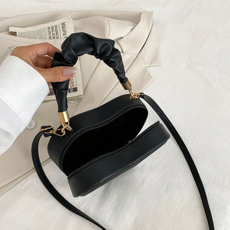 Lola – hartvormige gewatteerde crossbody tas van pu leer