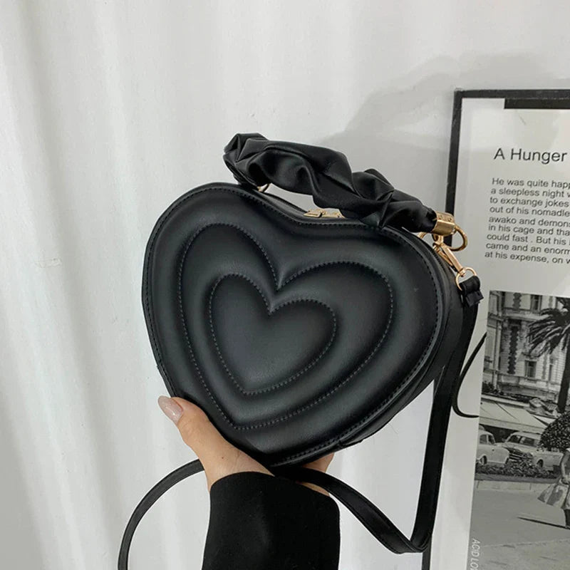 Lola – hartvormige gewatteerde crossbody tas van pu leer