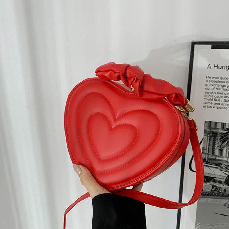 Lola – hartvormige gewatteerde crossbody tas van pu leer