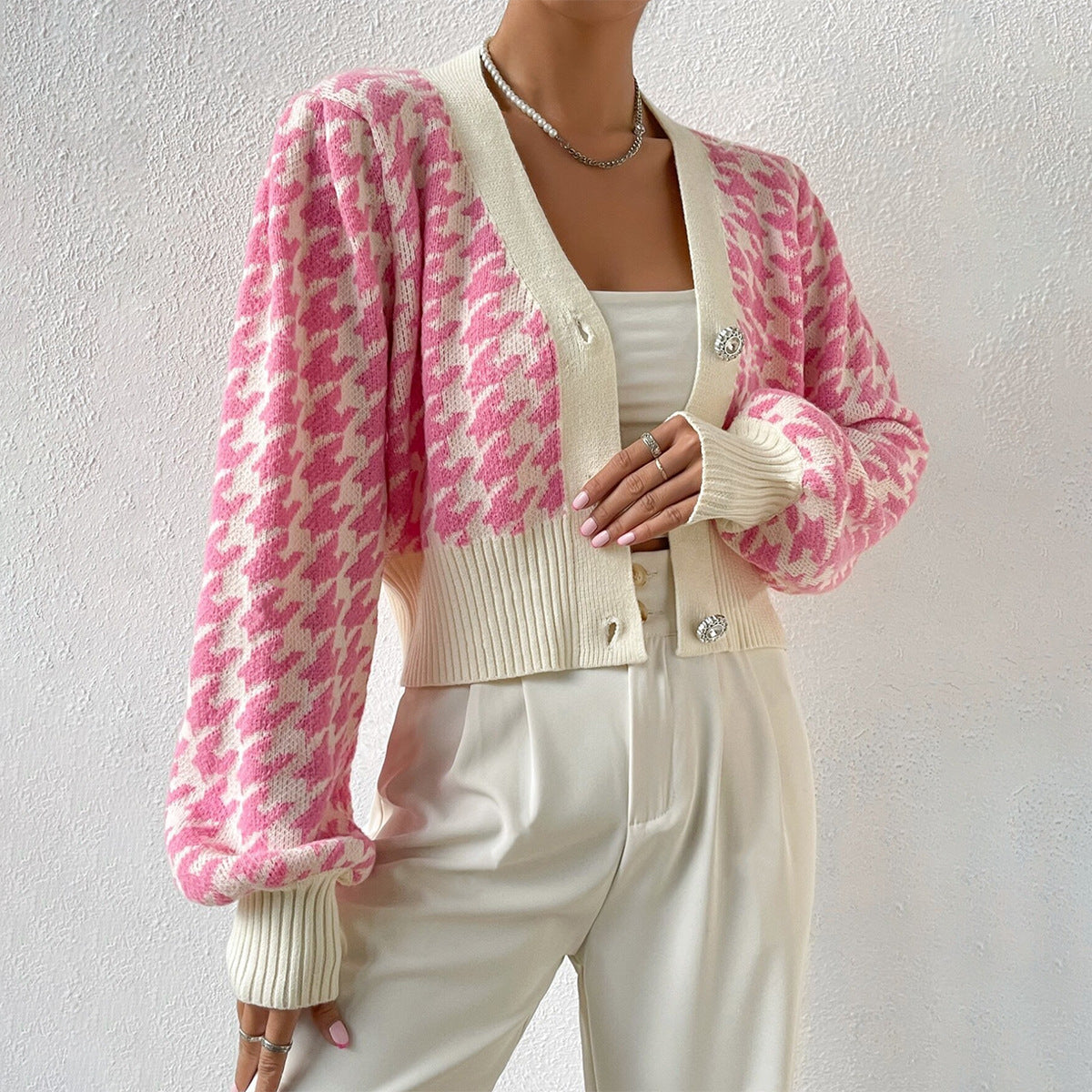 Loïs – gebreide cropped cardigan met houndstooth en ballonmouwen
