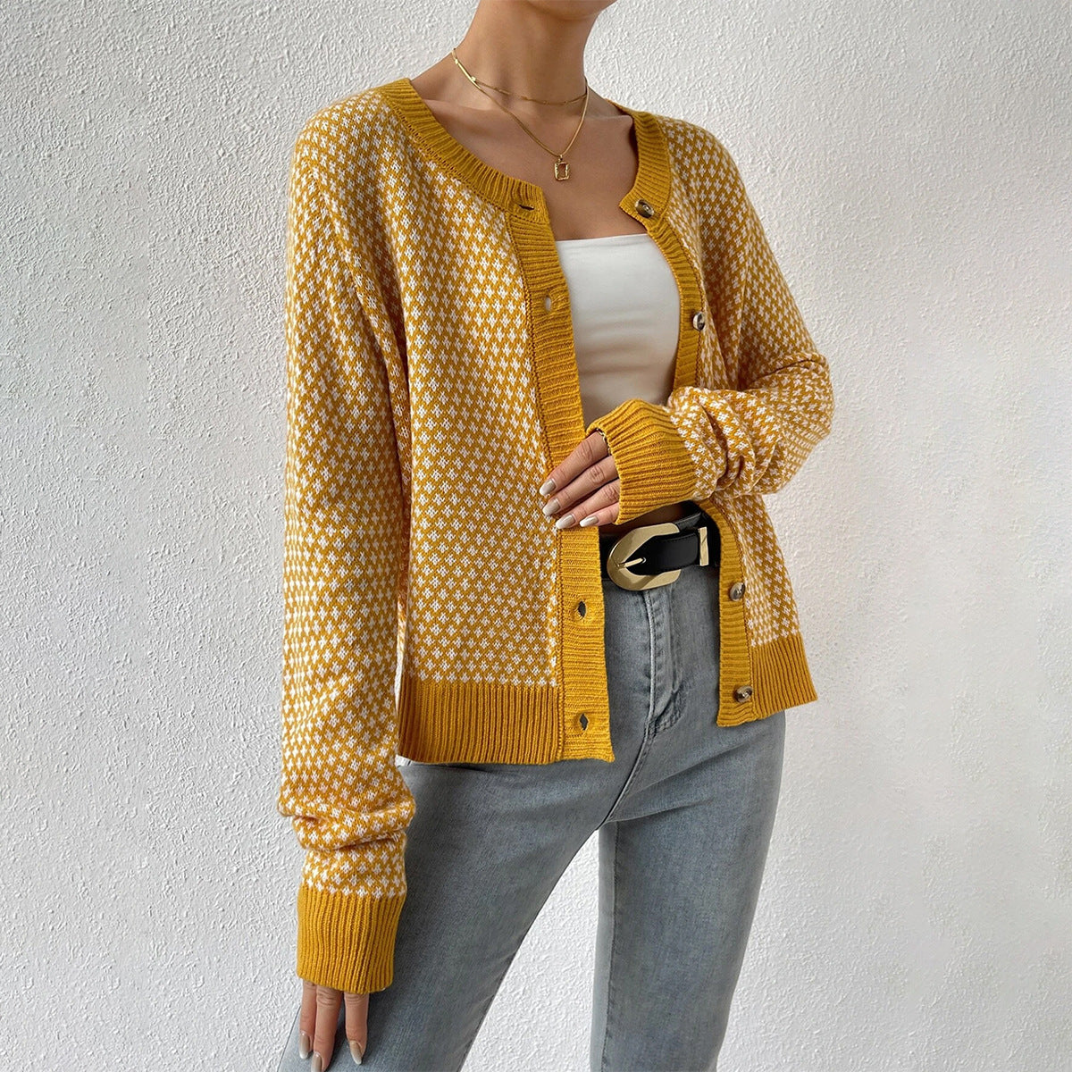 Noor – gebreide cardigan-vest met geometrisch patroon en knoopsluiting