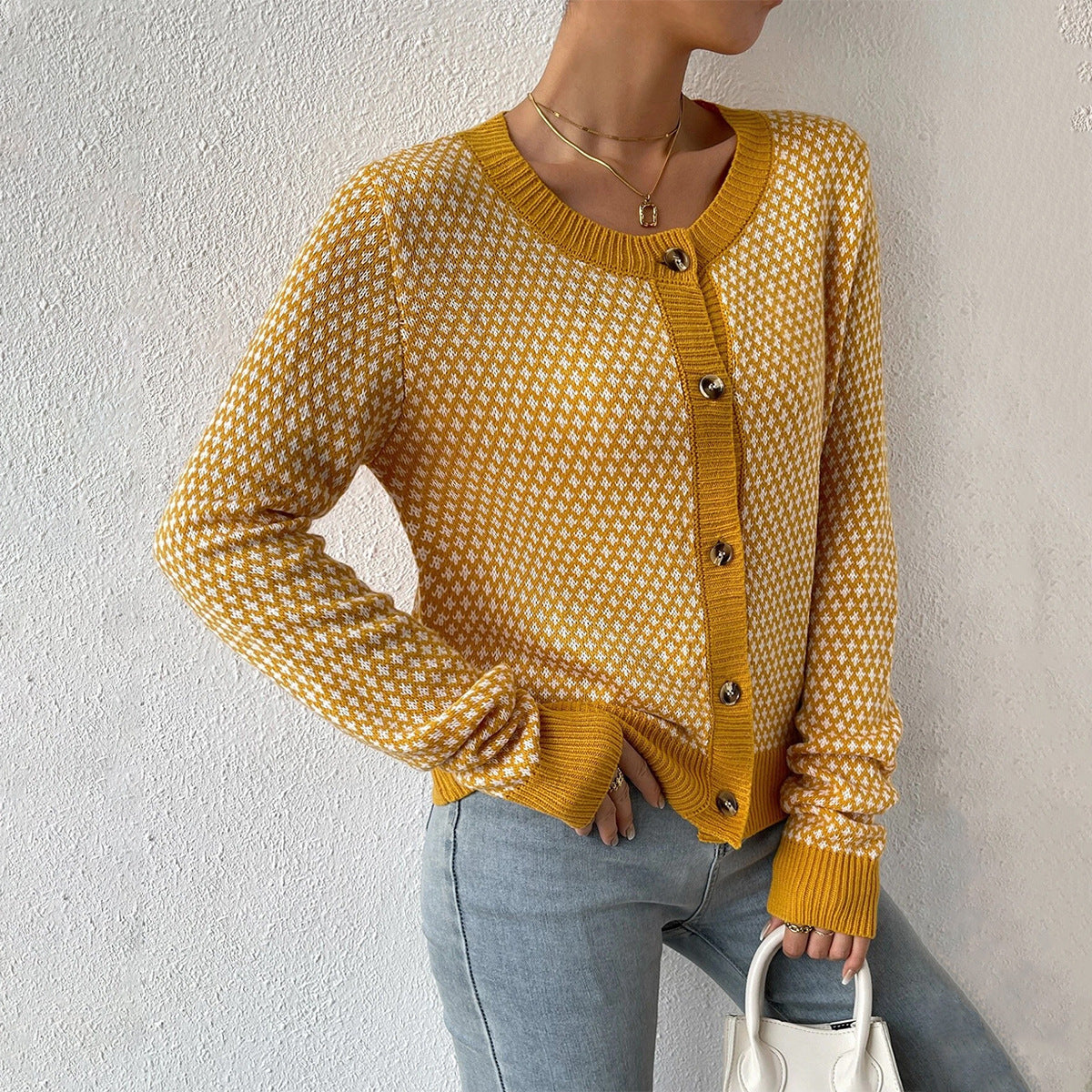 Noor – gebreide cardigan-vest met geometrisch patroon en knoopsluiting