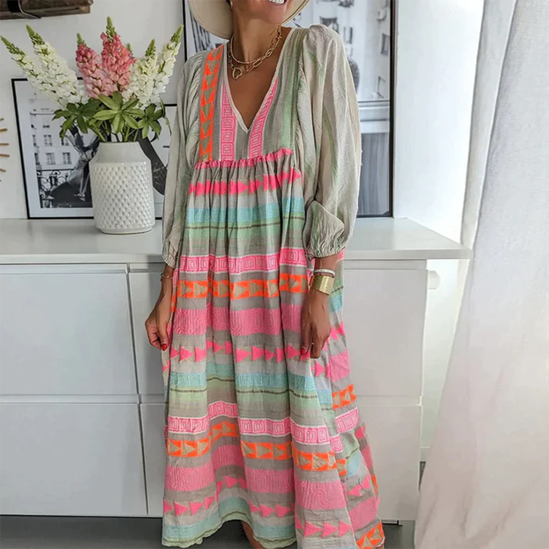 Yara – Boho katoenen maxi jurk met kleurrijk patroon en korte mouwen