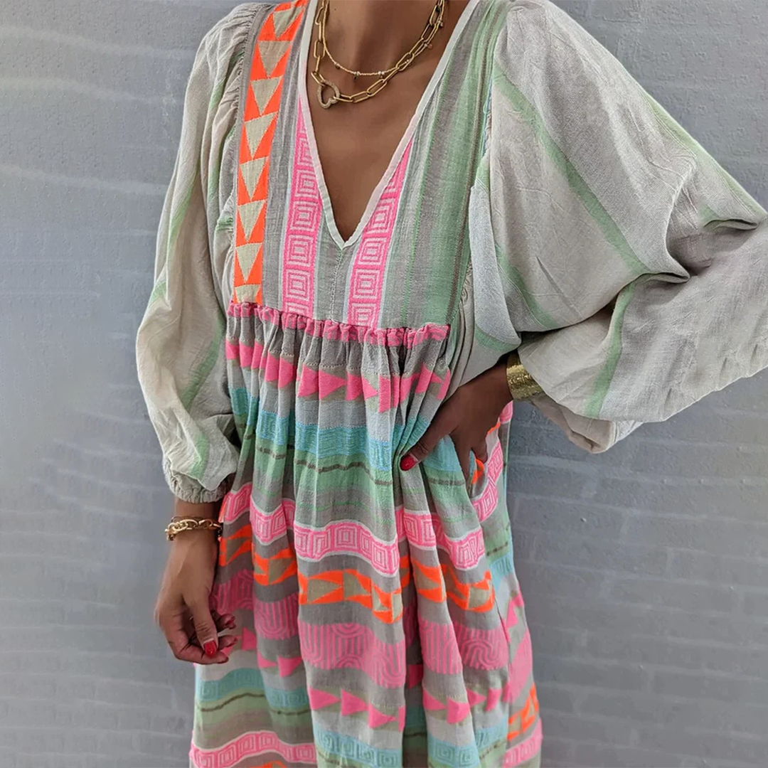 Yara – Boho katoenen maxi jurk met kleurrijk patroon en korte mouwen