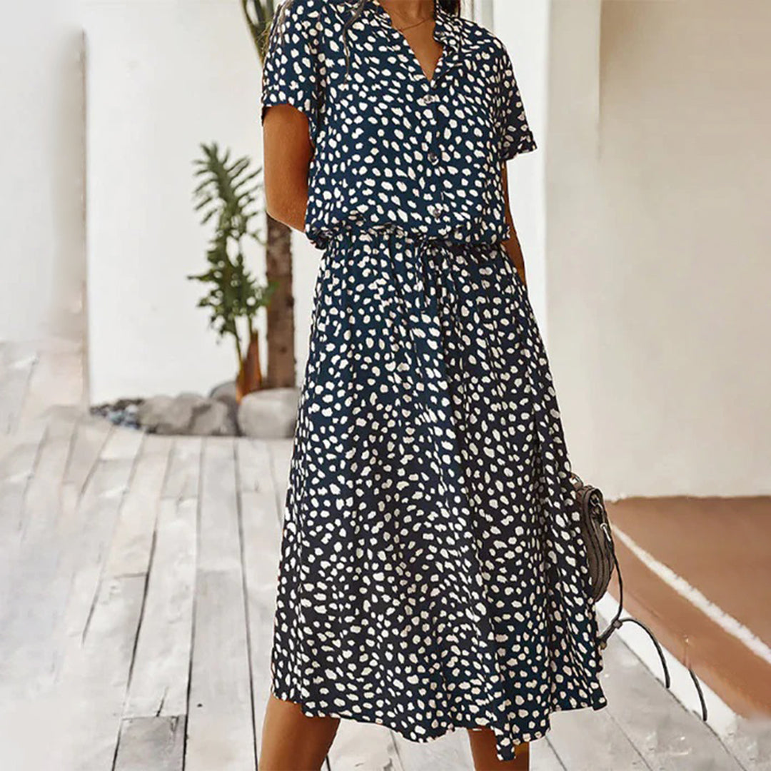 Nora – Luchtige Stippenprint Midi Zomerjurk