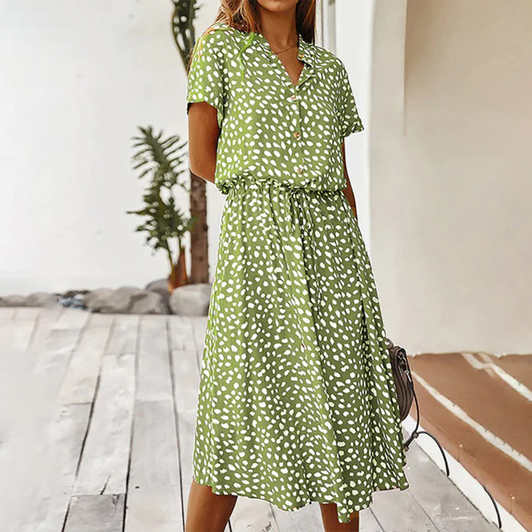 Nora – Luchtige Stippenprint Midi Zomerjurk