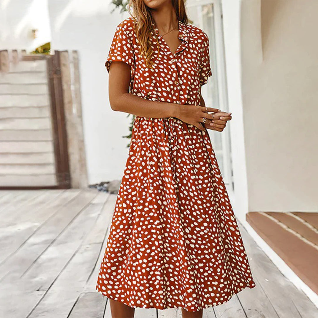 Nora – Luchtige Stippenprint Midi Zomerjurk