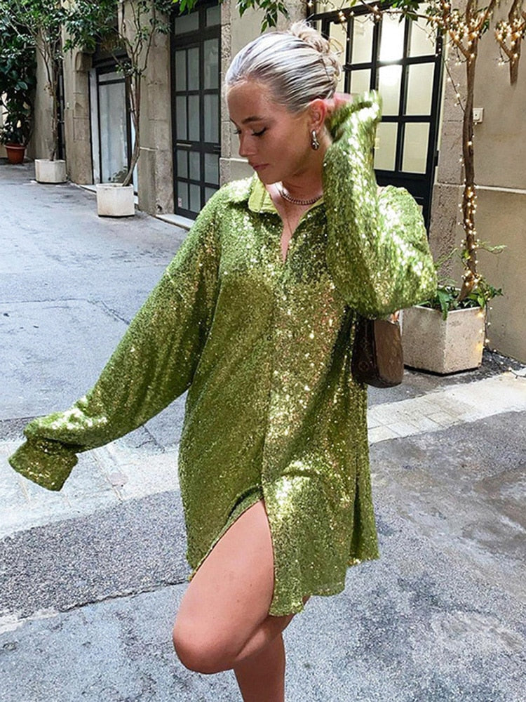 Sofie – Witte oversized blouse met zilveren glansdraad en ronde zoom