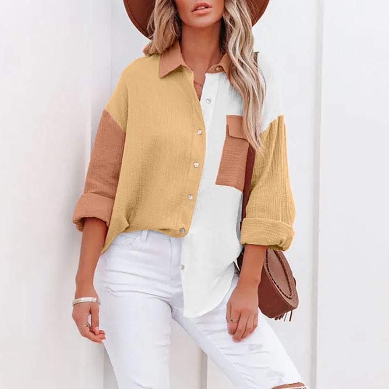 Shirley – V-hals blouse met knoopsluiting en opgerolde mouwen