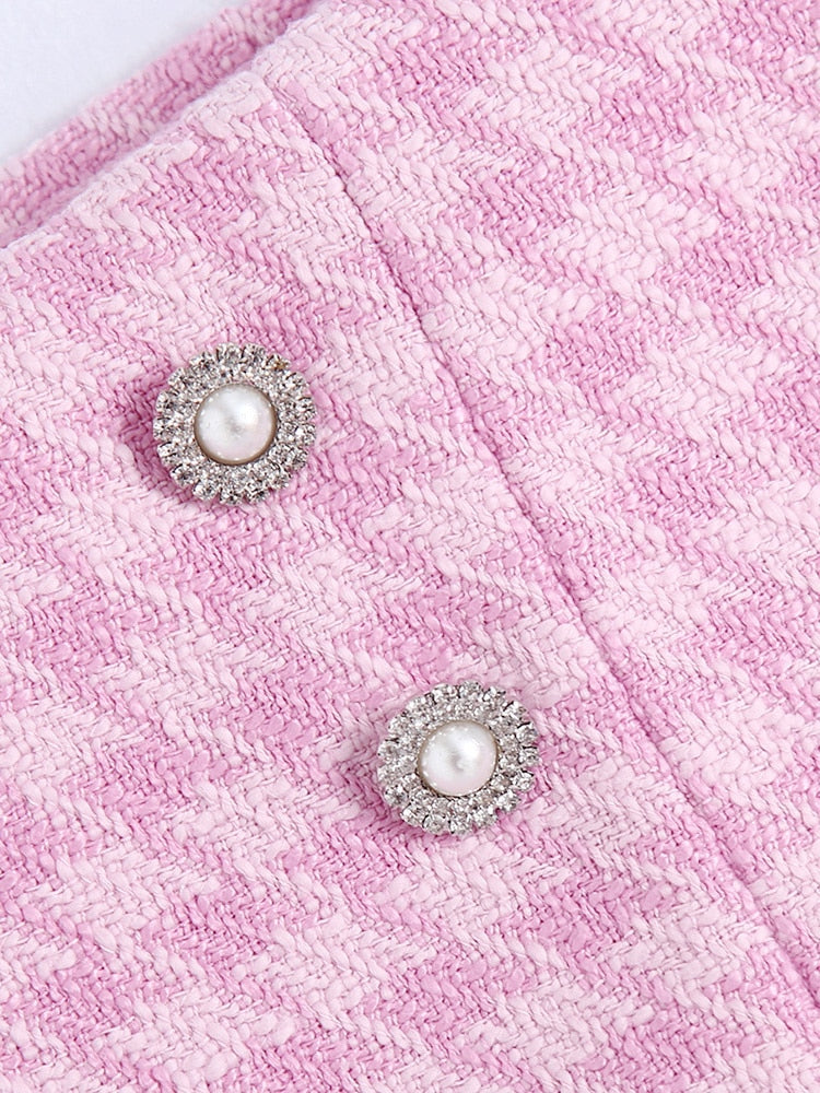 Isla – Roze 2-delige set met schouderpads en elegante knoopjes