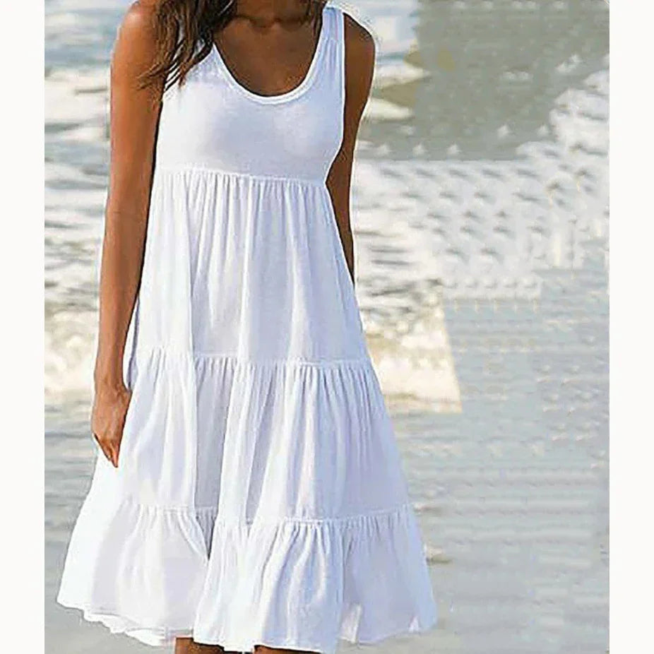 Yara – boho mini-jurk met mouwenloze snit en ruffle zoom