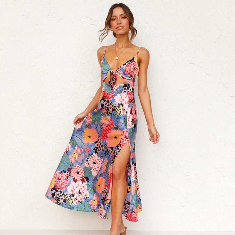 Ava – Zomer maxi bloemenjurk met verstelbare bandjes en elegante knoopdetails