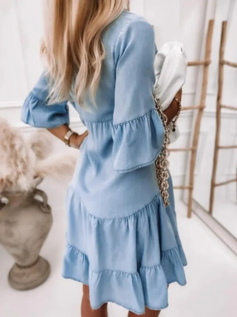Sanne – Denim midi-jurk met A-lijn en zwierige zoom
