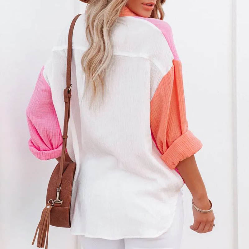Shirley – V-hals blouse met knoopsluiting en opgerolde mouwen