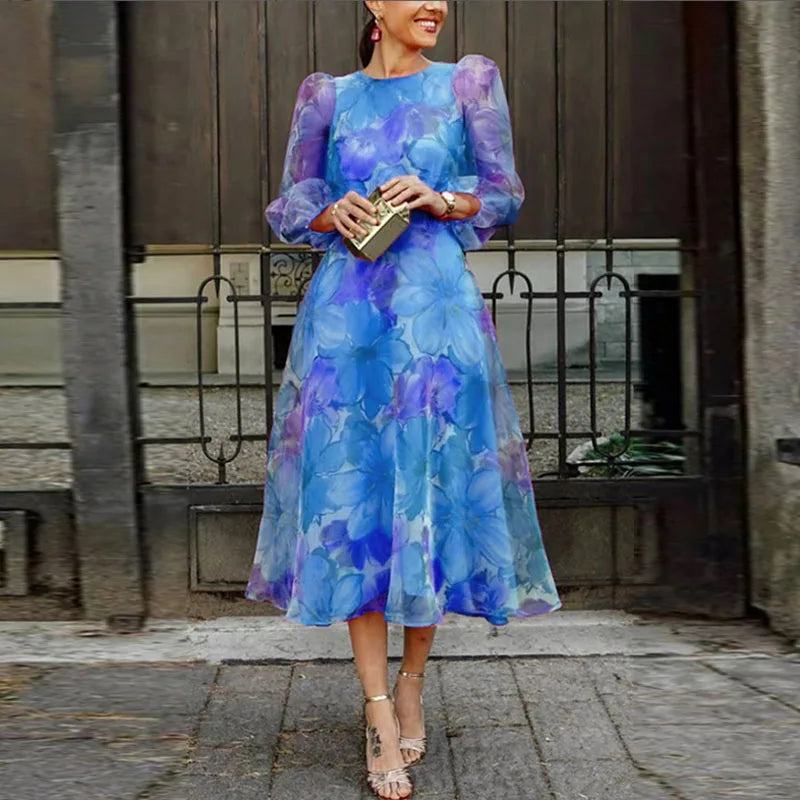 Lucy – Luchtige zomer midi Jurk met pofmouwen