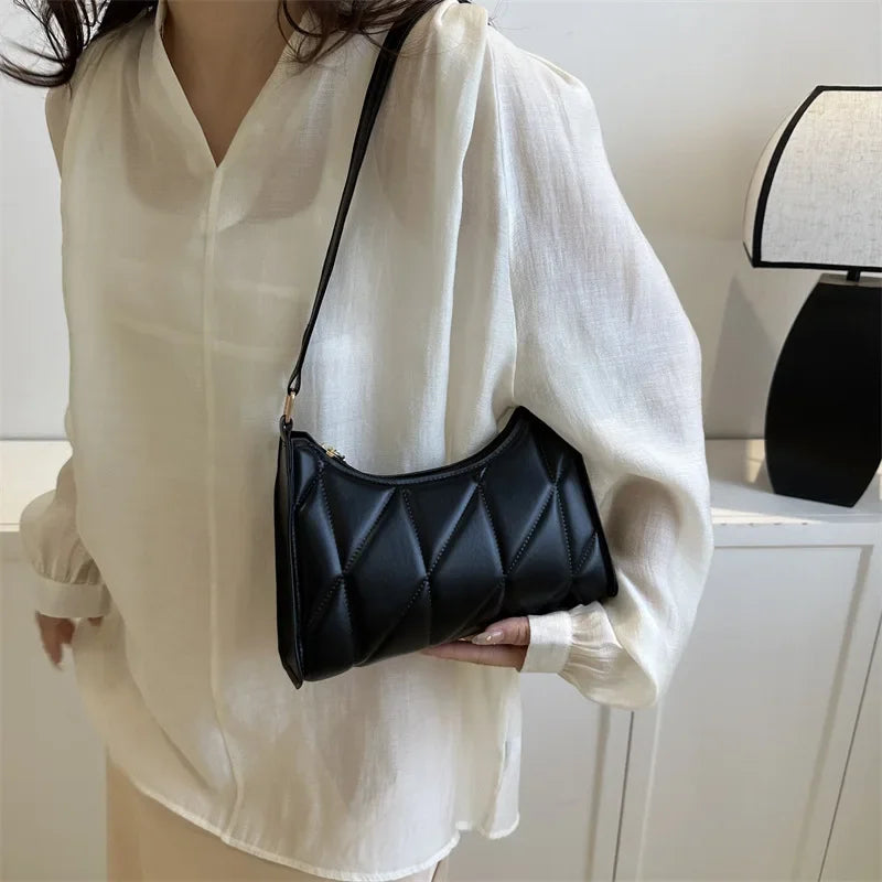 Luna – handtas van pu leer met strak design en korte schouderband