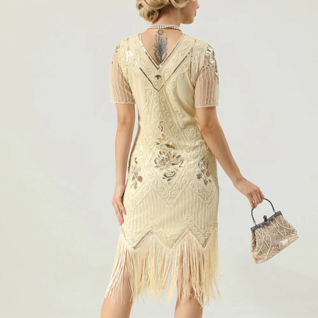 Clara – Retro glamour jurk met kralenwerk