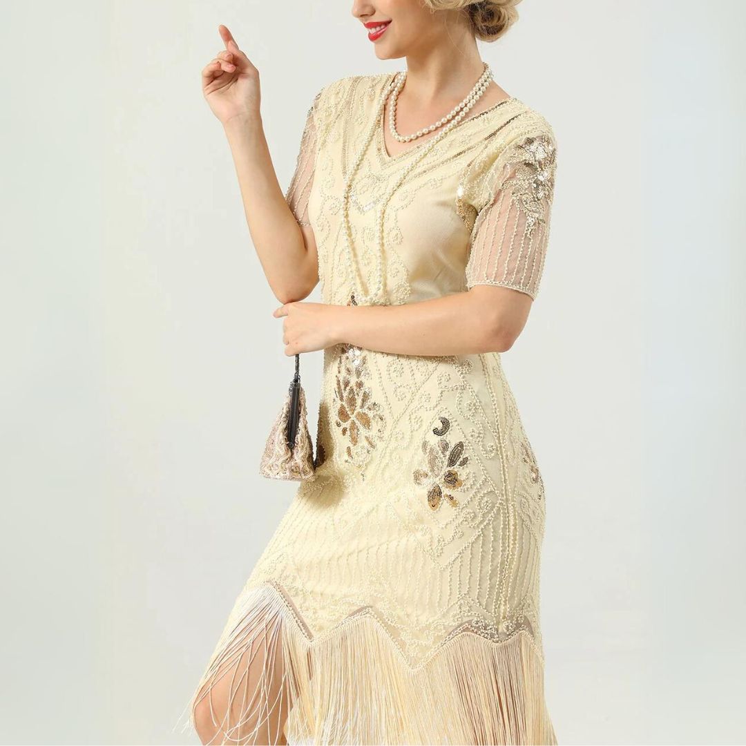 Clara – Retro glamour jurk met kralenwerk