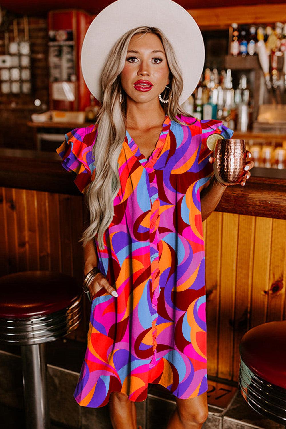 Liv – Shift jurk met zomers patroon en elegante ruffle mouwen